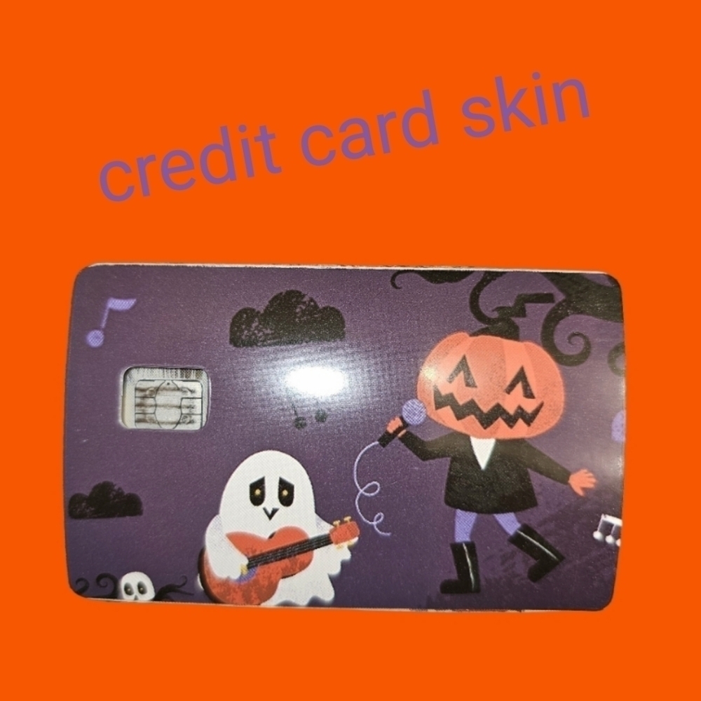 Pumpkin dancing & ghost playing guitar credit card skin for small chip cards